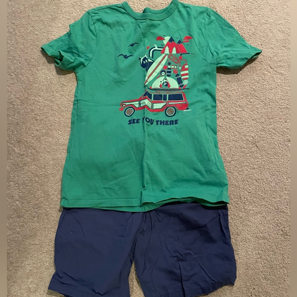 Green T-shirt and blue shorts